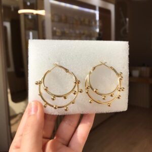 Brinco dupla essência