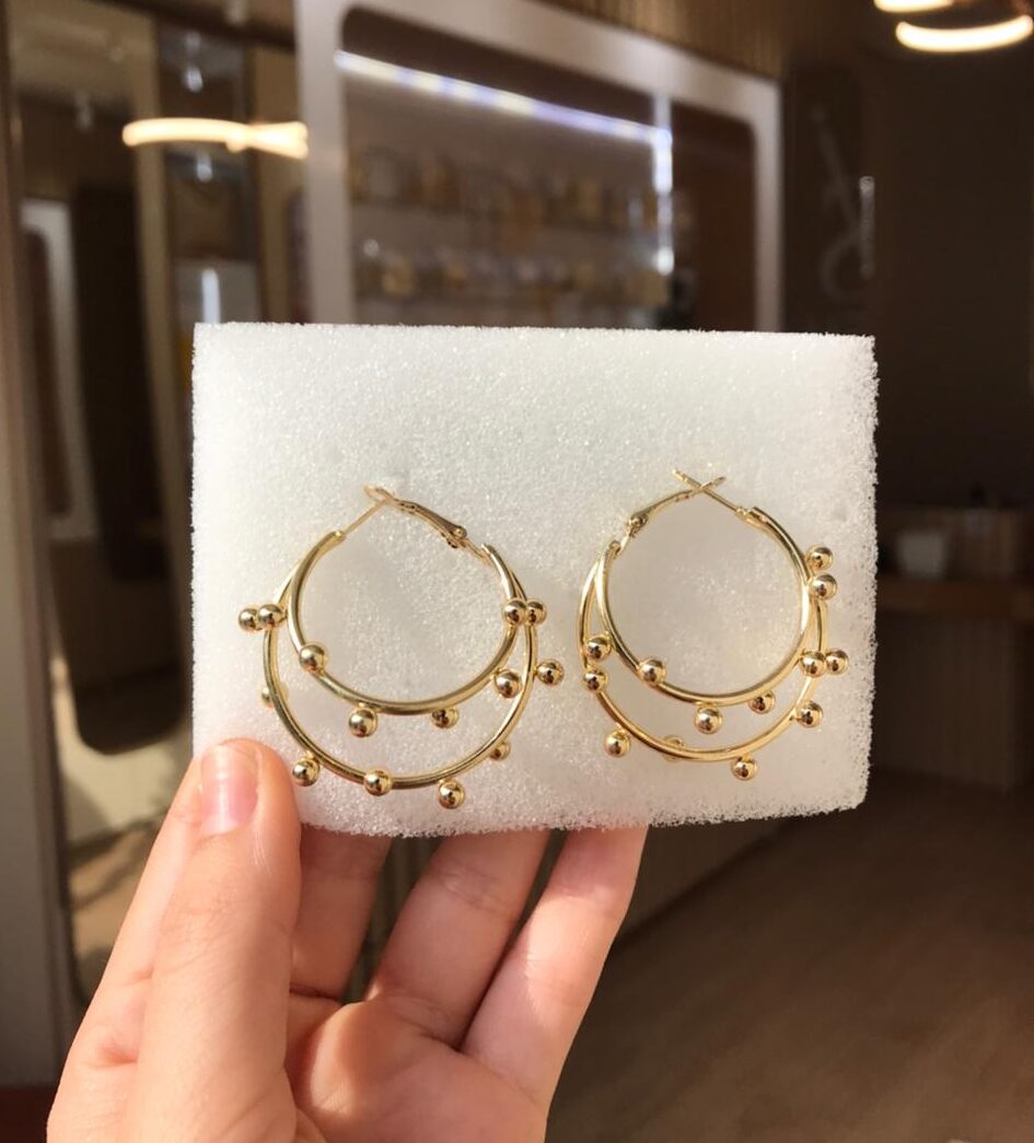 Brinco dupla essência