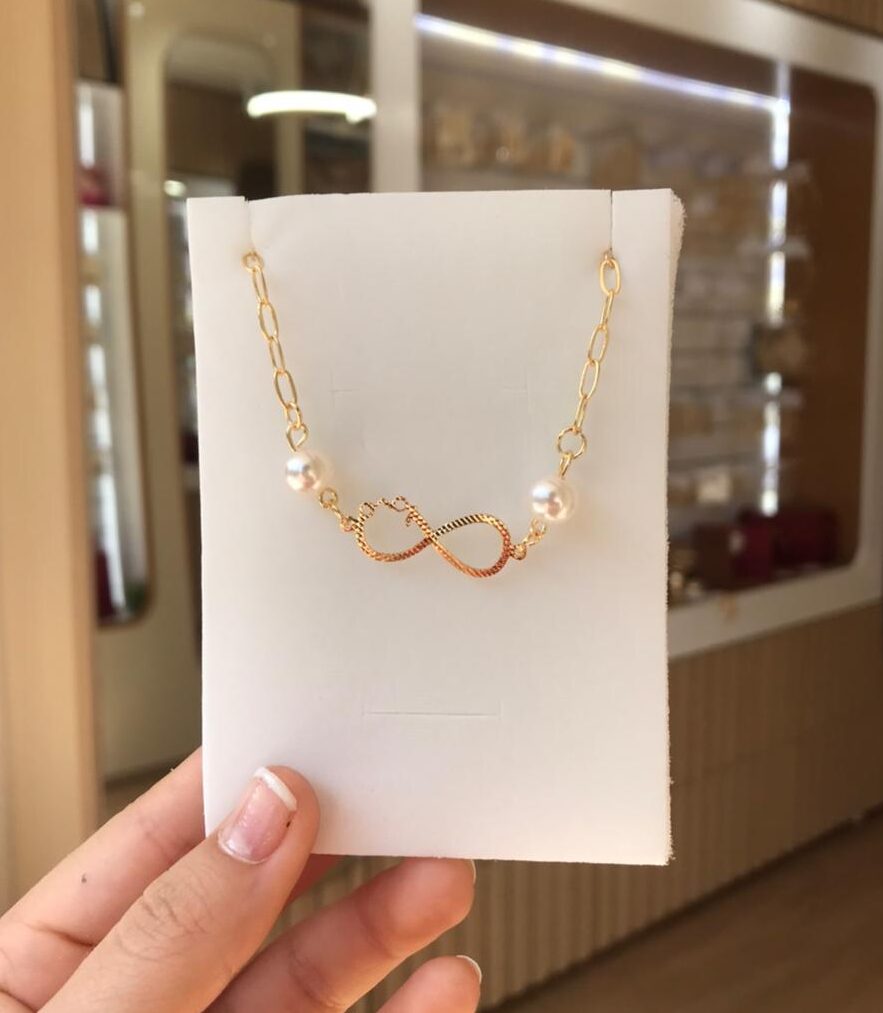 Pulseira infinty pérolas